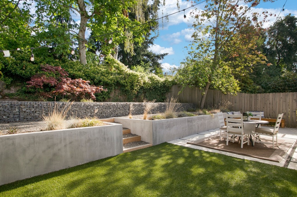 Hillside Hassle turned Haven: Why Retaining Walls are Essential for Sloped Seattle Yards